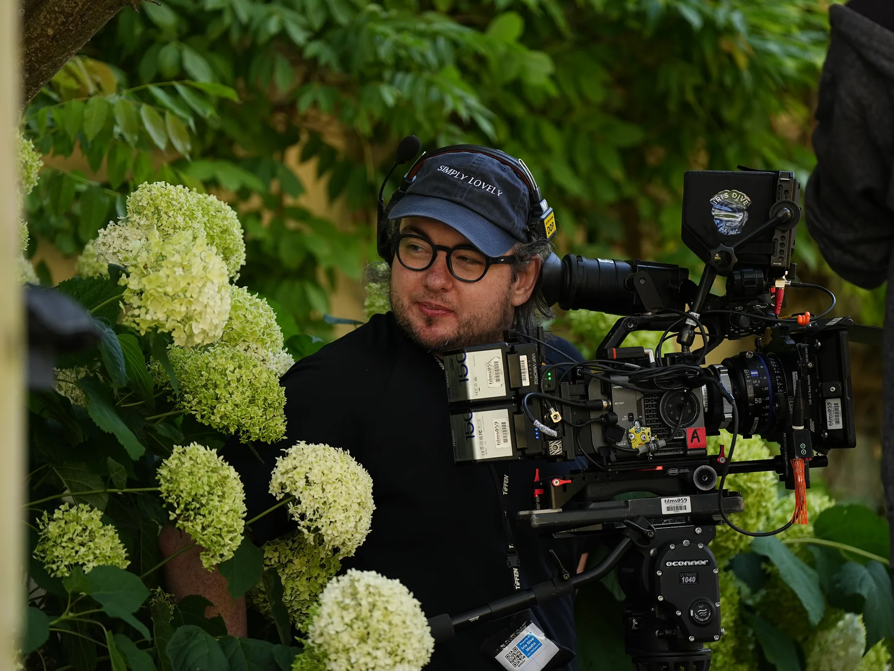 Camera operator filming on set